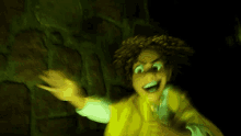 a cartoon character is standing in a dark room and waving .