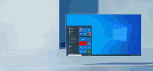 a computer screen shows the start menu and a few other icons