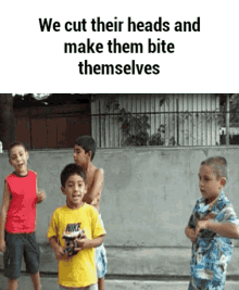 a group of young boys are standing in front of a wall with the words we cut their heads and make them bite themselves