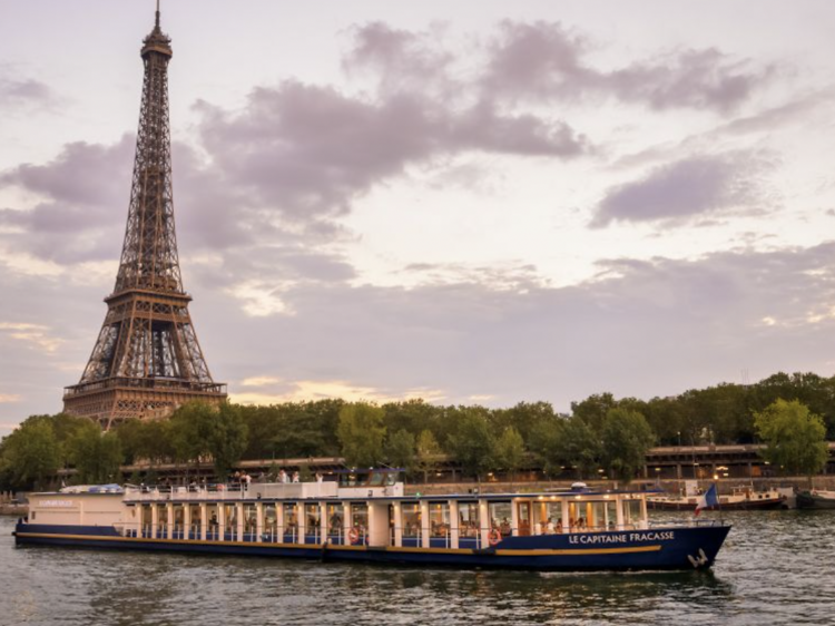 River cruise along the Seine with the Eiffel Tower in the background. 