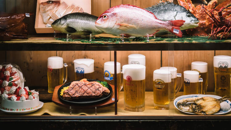 Fake beer and fish in Looks Delicious! exhibition