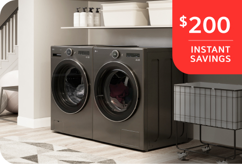 A washer and dryer set featuring a sign that reads "$200 instant savings" prominently displayed on the front.