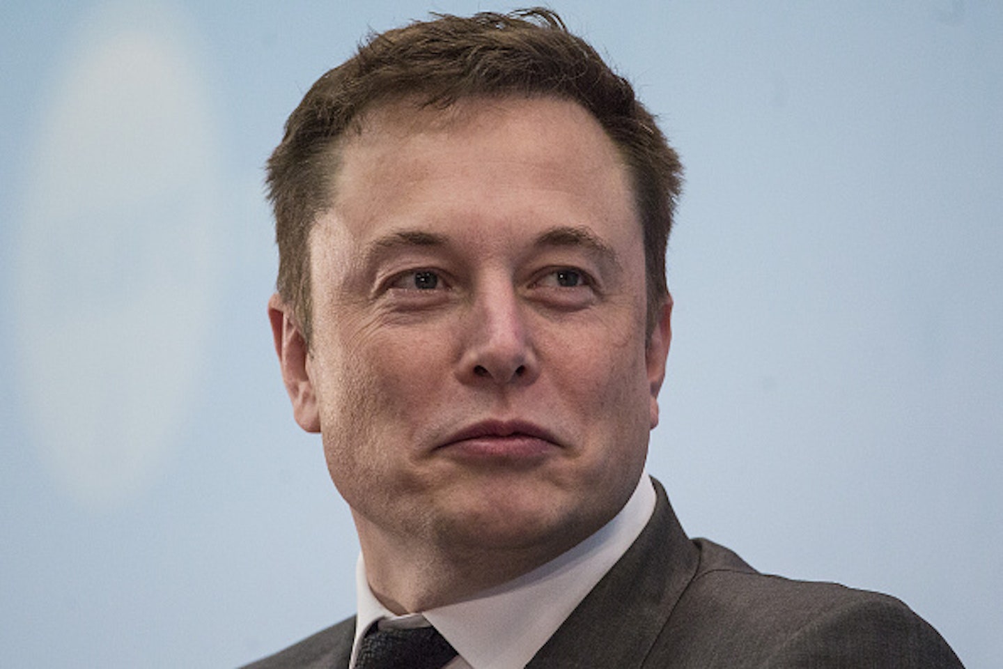 This image may contain Elon Musk Human Person Tie Accessories Accessory Head and Face