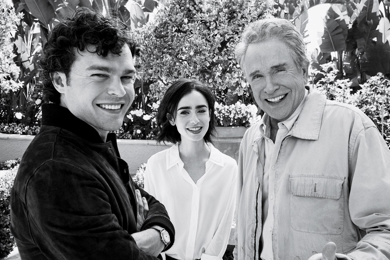 This image may contain Alden Ehrenreich Human Person Face Lily Collins Clothing Apparel Smile and Warren Beatty