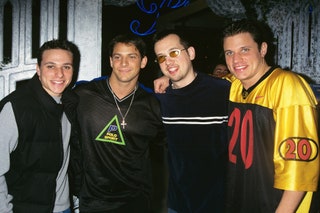 This image may contain Nick Lachey Human Person Clothing Apparel Drew Lachey Sleeve Glasses and Accessories