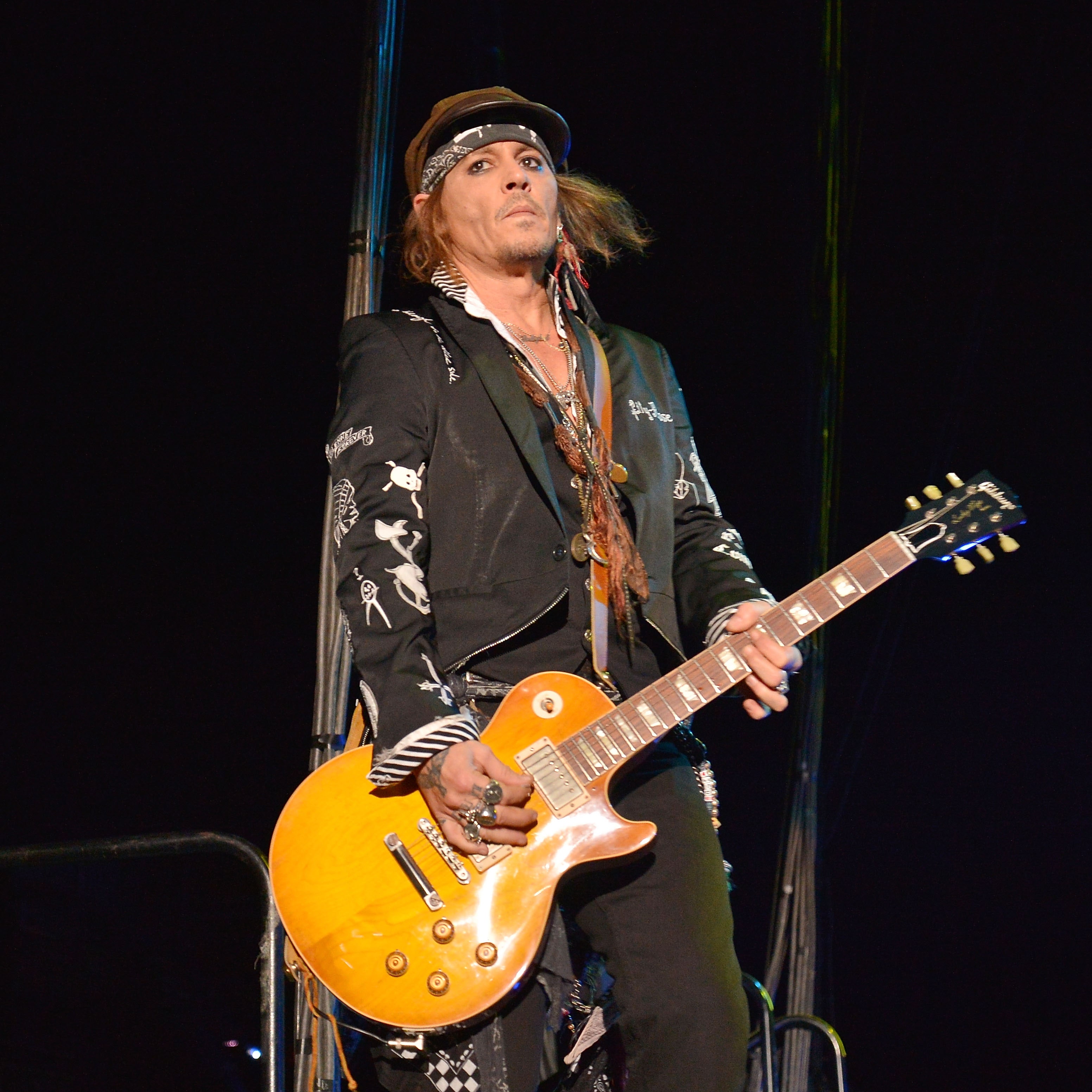 Johnny Depp Makes Surprise Appearance During Jeff Beck Gig