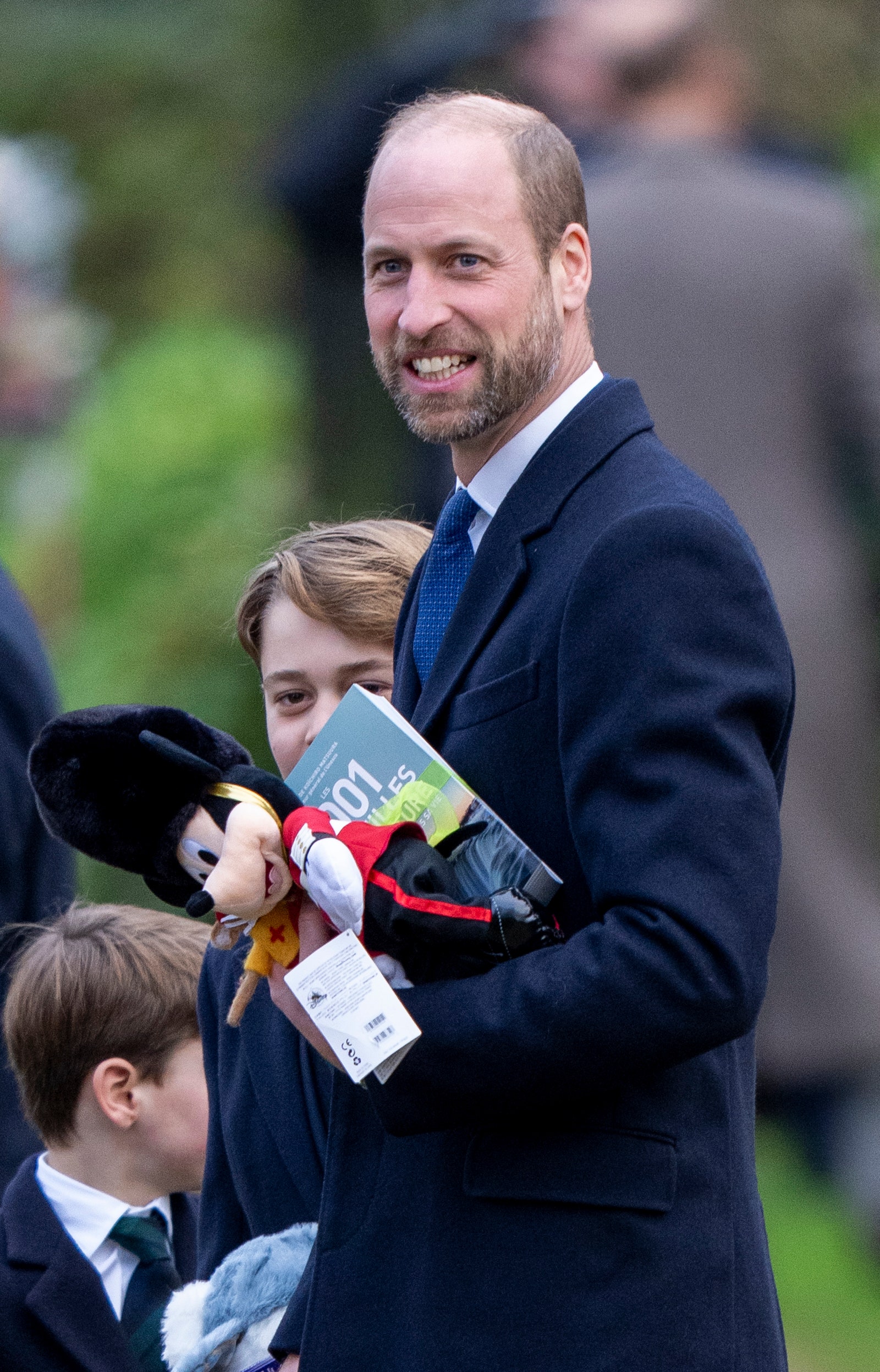 Image may contain Prince William Duke of Cambridge Prince George of Cambridge Face Head Person and Photography