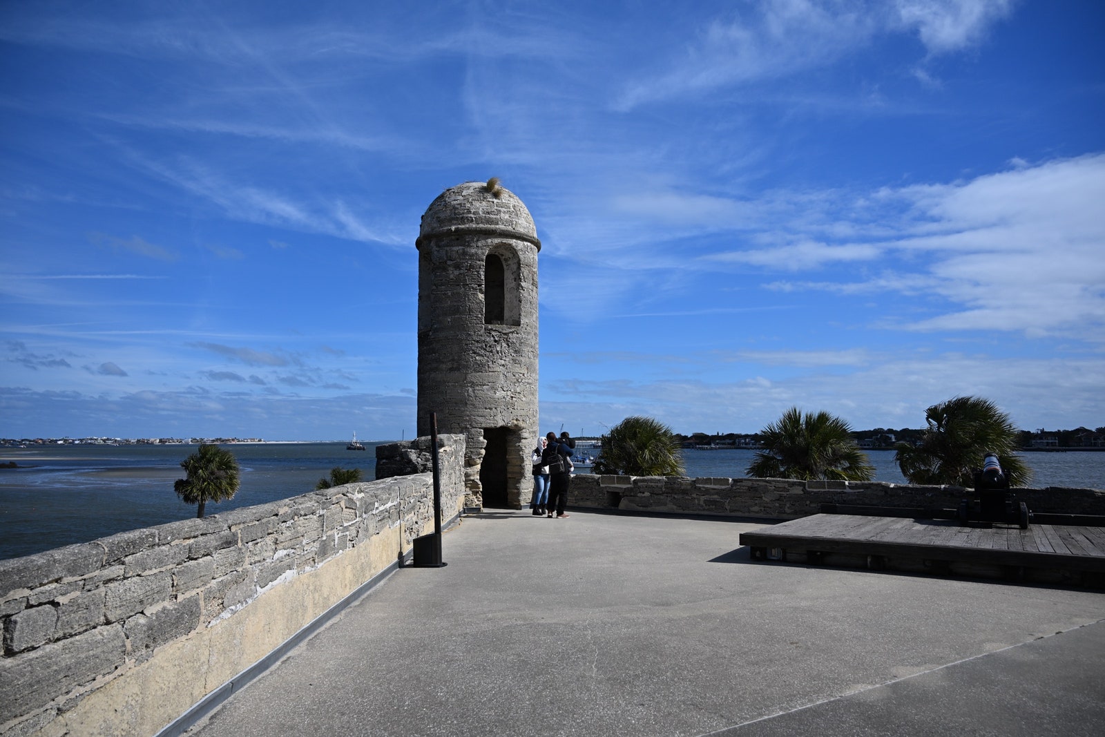 Image may contain Nature Outdoors Scenery Water Waterfront Architecture Building Castle Fortress Person and Sea