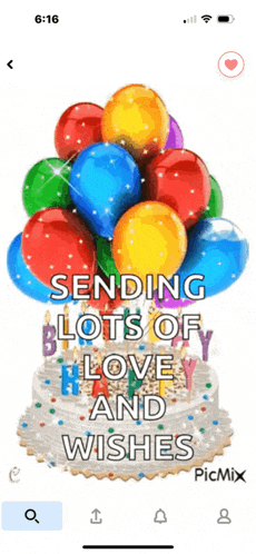 a phone screen shows a birthday cake with balloons on it and the words sending lots of love and wishes