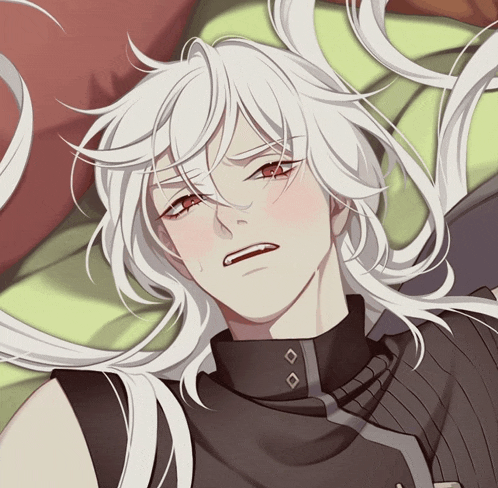 a man with long white hair and red eyes is laying on a bed