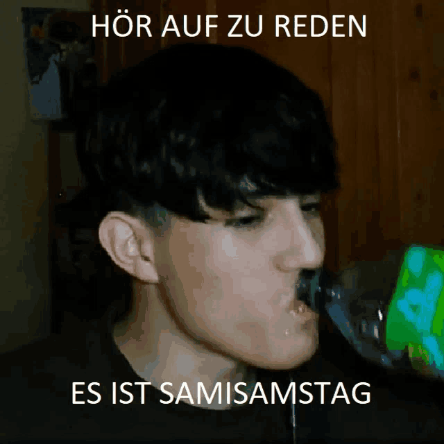 a young man drinking from a bottle with the words " es ist samsamstag " written below him