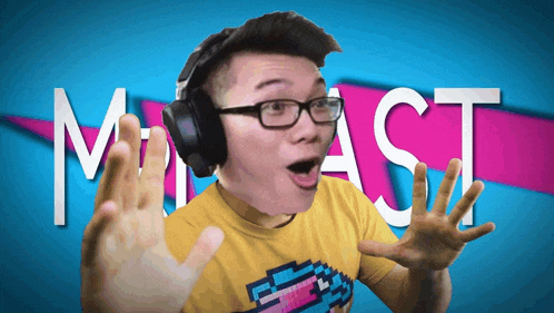 a man wearing headphones and a yellow shirt is standing in front of a blue and pink background that says " miast "