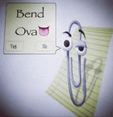 a paper clip with eyes and a tongue is talking to a speech bubble .