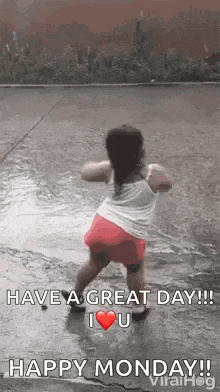 a little girl is dancing in the rain and says `` have a great day ! ''