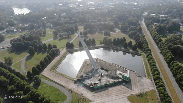 an aerial view of a park with the word policija on the bottom