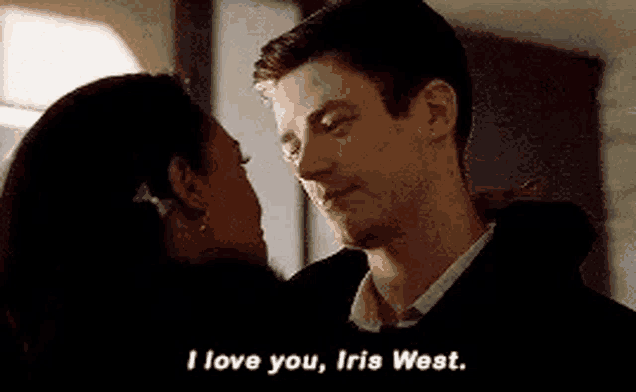 a man and a woman are looking at each other and the man is saying `` i love you , iris west '' .