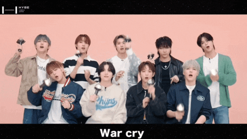 a group of young men are standing in front of a pink background with the words war cry in the corner