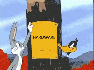 bugs bunny and daffy duck hang a sign that says hardware