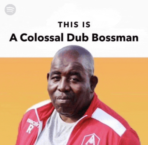 a man in a red jacket with the words " this is a colossal dub bossman " on the bottom