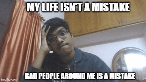 a man with glasses is making a funny face with the caption " my life isn 't a mistake