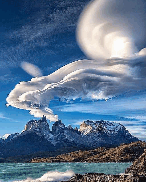 a mountain with a lake in front of it