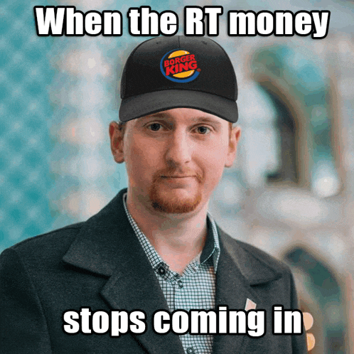 a man wearing a burger king hat is making a meme