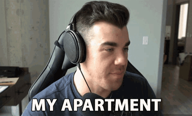 a man wearing headphones says " my apartment "