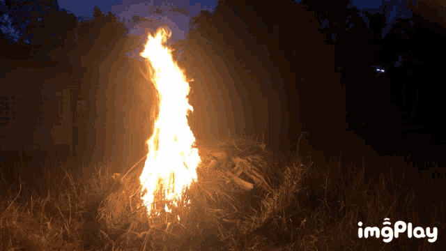 a picture of a fire with the words imgplay underneath