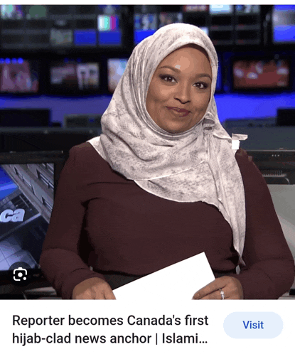 a woman wearing a hijab is sitting at a news desk with a visit button below her