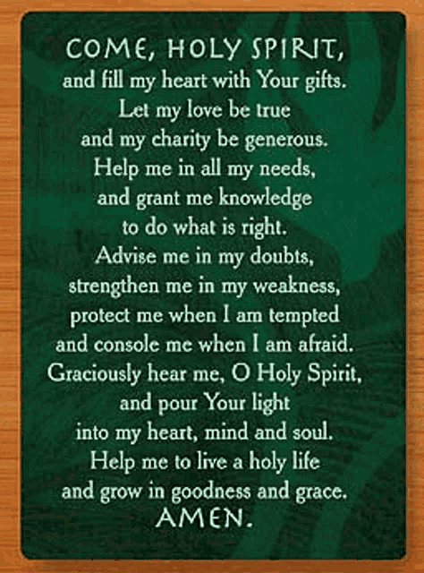 a prayer on a wooden table that says `` come holy spirit , and fill my heart with your gifts . ''