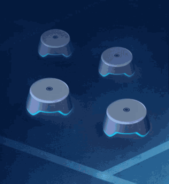 a row of glow in the dark step stools on a dark blue surface