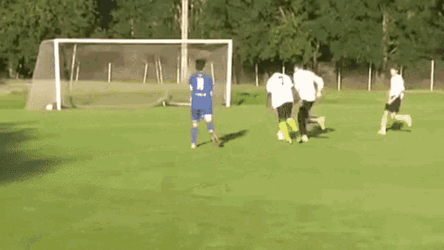 a group of people are playing soccer on a field . one of the players has the number 10 on his shirt .