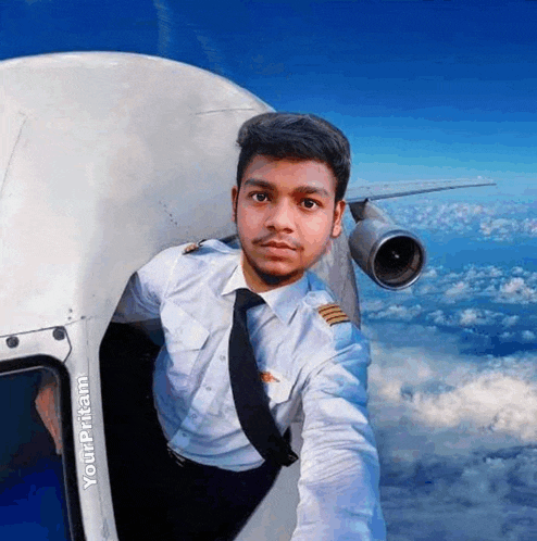 a man in a pilot 's uniform takes a selfie