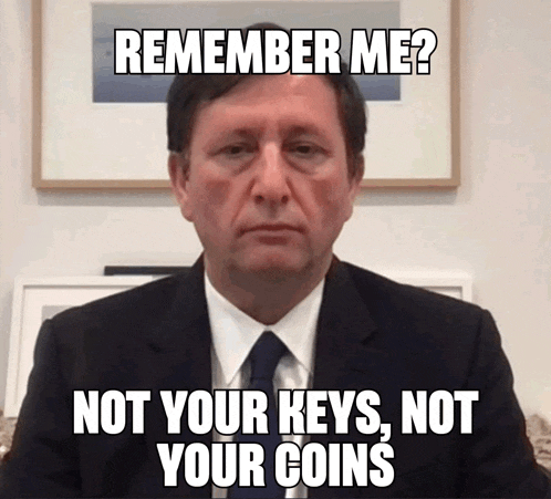 a man in a suit and tie has a meme on his face that says remember me not your keys not your coins