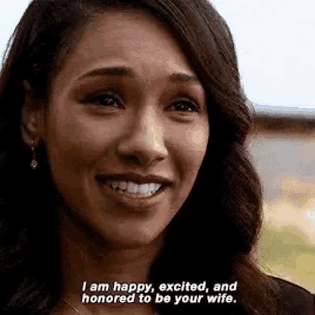 a close up of a woman 's face with a quote on it .