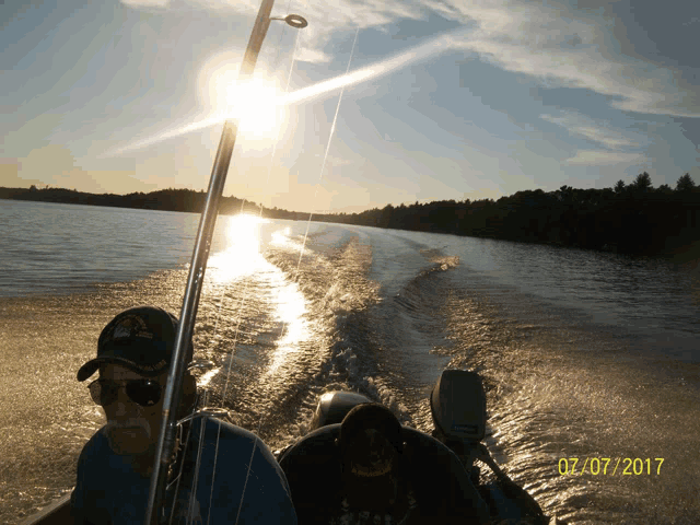 a man on a boat with the date 07/07/2017 on the bottom of the photo