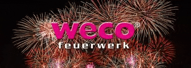 there is a fireworks display in the background and the logo for weco feuerwerk