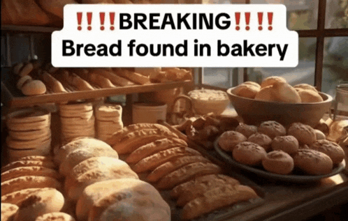 a bunch of bread on a table with the words breaking bread found in bakery on top