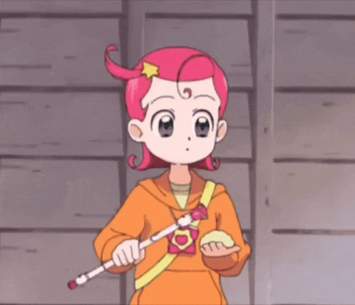 a girl with pink hair is holding a wand