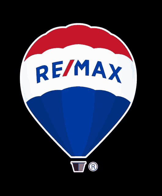 a red white and blue hot air balloon with the re/max logo on it