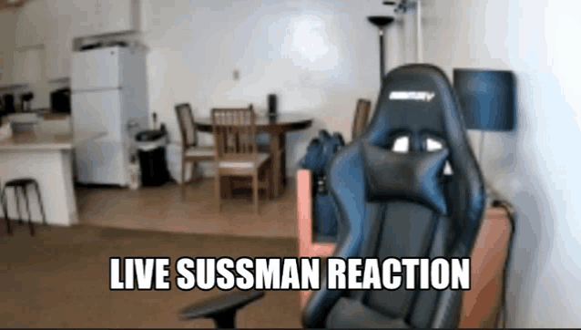 a gaming chair in a living room with the words live sussman reaction