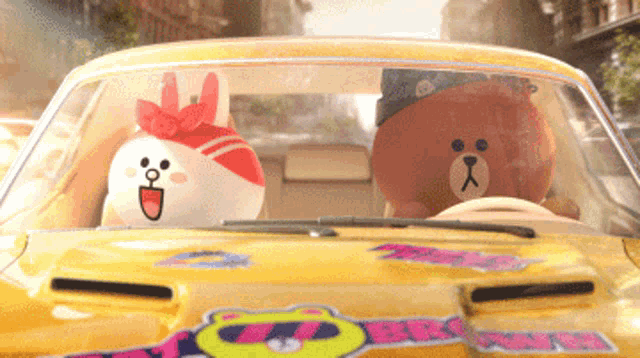 a brown bear and a white rabbit are in a yellow car