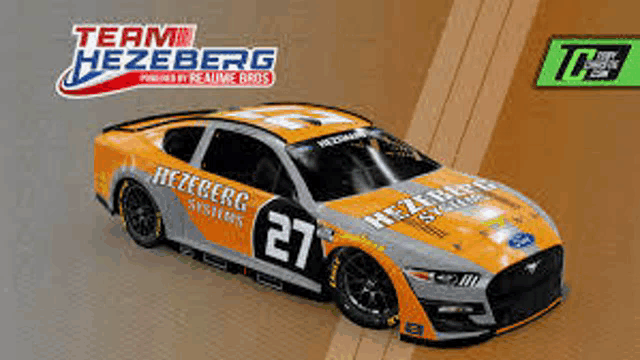 a ford mustang race car with the number 27 on the side is on a race track .