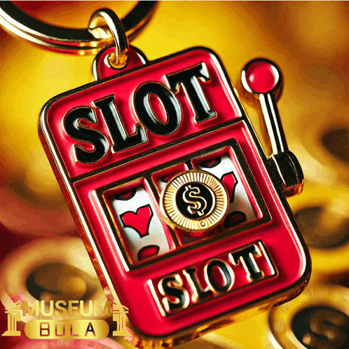 a red slot machine shaped keychain with the words slot on it