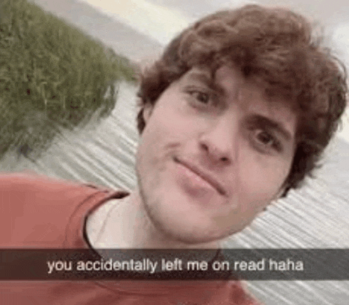 a man is taking a selfie with a caption that says `` you accidentally left me on read hahaha '' .