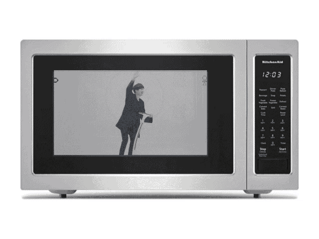 a kitchenaid microwave shows a picture of a man on the screen