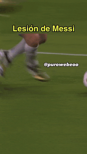 a soccer player is being tackled by another player with the words lesión de messi above him