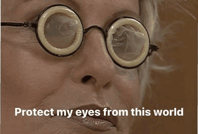 a woman wearing glasses with condoms on her eyes with the words protect my eyes from this world