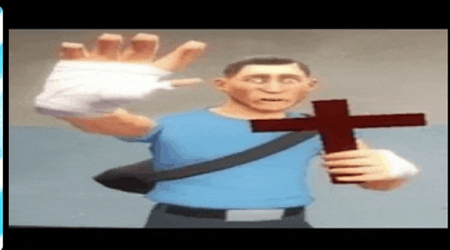 a man in a blue shirt is holding a cross in his hands .