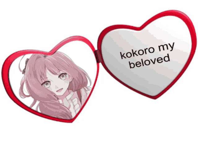 a heart shaped mirror that says kokoro my beloved on it